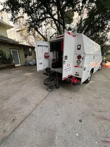 Magnet Plumbing service vehicle on-site for Grease Trap Cleaning in Ardulusa